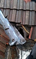 WATER poured into the building after lead flashing was stripped by thieves 
