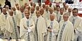 BELOVED . . . popular Canon Eugene Dolan (front left) celebrates 50 years in the priesthood with a Mass at St Edward’s, Lees