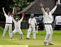 GOT HIM: Greenfield batsman Chris Gill can't believe he is out as Uppermill's bowler James Baron and wicketkeeper Alex Griffiths appeal. 