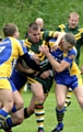 CARRYING THE FIGHT: St Anne’s Sean Thomas gets stuck in. 