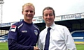 ALL SMILES . . . Neil Joy (right) with Robbie Simpson. 
