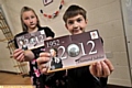 Dobcross pupils Olivia Wood (11) and Julian Bayley (10) from Holy Trinity School with their special coins 

