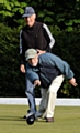 WATCHING OVER YOU . . . Len Kewley looks on as Alan Taylor sends down a bowl in the qualifier at Moorside. 
