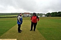 WHAT A WASH-OUT: umpires Chris Mayer (left) and Peter Darby stage an inspection before calling off yesterday’s Friarmere v Uppermill match in the Saddleworth League. 
