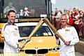 teacher Paul McEvoy passes the torch to Richard Webster in Crosby.