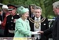 THE Queen visits Alexandra Park, Oldham on July 18, 1992 and is greeted (above) by the Mayor Cllr Norman Bennett and Colin Smith (chief executive of OMBC) before going on walkabout (below). 
