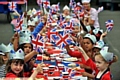 FOR Queen and country . . . pupils get in the party mood 

