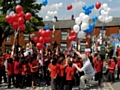 CHILDREN at St Hilda’s release their balloons 
