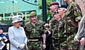 Jodie Smith was presented to the queen in Bromley, Kent — she’s the shortest soldier in the line-up on the right 
