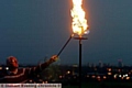 BURNING bright: Tony Tomlinson from Chadderton Events committee lights the beacon at Chadderton Heights Farm 
