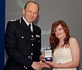 Proud moment . . . Melissa is handed her award by ACPO president Sir Hugh Orde 
