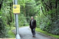 PATH of fear . . . Councillor Battye on the footpath between Hamilton Street and Mumps station 
