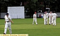 THE LONG WALK: Alan Drose of Royton trots off the field as Werneth celebrate taking his wicket. 