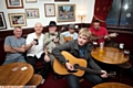 HITTING the right note: Kieran McMahon with fellow folk musicians at the Waggon Inn 


