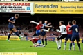 HEAD MASTER: James Tarkowski connects powerfully to put Athletic in front at Bootham Crescent. 