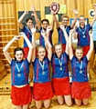 WE DID IT! Oldham Netball Club under-13s celebrate. 