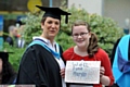 WELL done mum: Erin Maughan displays her pride at her mum Tracey’s achievement 
