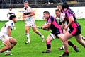 Oldham's Alex Thompson tries to find way through. 
