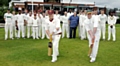 HIT for six . . . the teams line up at Glebe Street 
