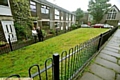 FENCED off: Janet Callander and Brian Hall outside their homes 
