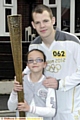 BEST birthday ever: Elli Shaw with Andy Lofthouse and the Olympic torch 
