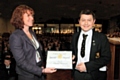 INSPIRATIONAL... Thomas Harrison receives the Year 11 Special Award from with head teacher Sarah Calvert 
