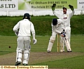 GONE: Royton’s Craig Joy is dismissed by Ali Musafa, of Milnrow.. 