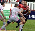 Paul Noone takes the ball up on another poor afternoon. 