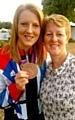 MAGIC moment: Oldham’s Olympic hockey bronze medallist Nicola White shows her prize to her mum in Hyde Park 

