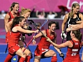 Great Britain - including blonde Nicola on the left – celebrate a goal during the bronze medal play-off. 