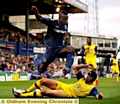 Athletic new boy Jordan Slew is stopped in his tracks by Sheffield Wednesday’s Miguel Lleera.