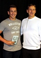 Richard Walker (left) receives his player of the year award from Phil Costin. 
