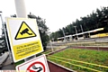 STEER clear . . . CCTV warning signs at the Mumps Metrolink station 
