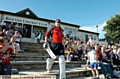 FORMER England captain Michael Vaughan accepts the applause of cricket fans as he goes out to bat in last night’s Twenty20 game between the NatWest Legends and Royton CC. 