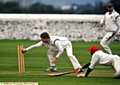 THAT’S OUT . . . Arshad Mahmood makes a desperate attempt to reach his crease. 