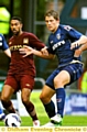EYES ON THE BALL: James Tarkowski covers against City. 