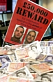 £50,000 reward offer for killers’ arrest 
