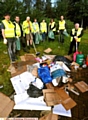 CLEANING up the mess: volunteers with Councillor Steven Bashforth, right 

