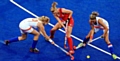 MEDAL PROSPECT: Nicola White (centre) in action 
