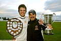 WELL DONE, MY SON: man-of-the-match Ryan Barnes, and dad Mark with the Tanner Cup. 