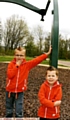 Brothers Malachi and Luca Pearson after vandals wrecked their favourite swing in Greenacres 
