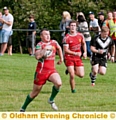 GO CRAIG, GO: Waterhead’s Craig Highton sprints for the line against Heworth. 