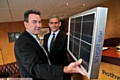 SUNNY side up: Alan Rothwell (left) and Wayne Brierley with a solar panel