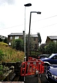OLD and new: a shiny new lamppost and the one it will replace in Abbey Road, Delph 