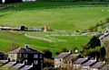 VISION for the future . . . how the house (at the centre of the picture) will look in the Delph hillside 