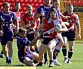 MICHAEL Ward tries to get away from a tackle for Oldham. 