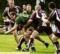 NOWHERE TO GO: Jordan Golloway of Oldham St Anne’s is stopped in his tracks by a stubborn Millom defence.