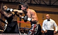 FIGHT NIGHT: Victorious Ronnie Heffron lands a shot on Simone Lucas. 