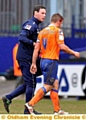 ATHLETIC midfielder James Wesolowski walks off the field with blood pouring from a head wound. 
