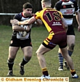 Phil Wood finds his way through blocked. 